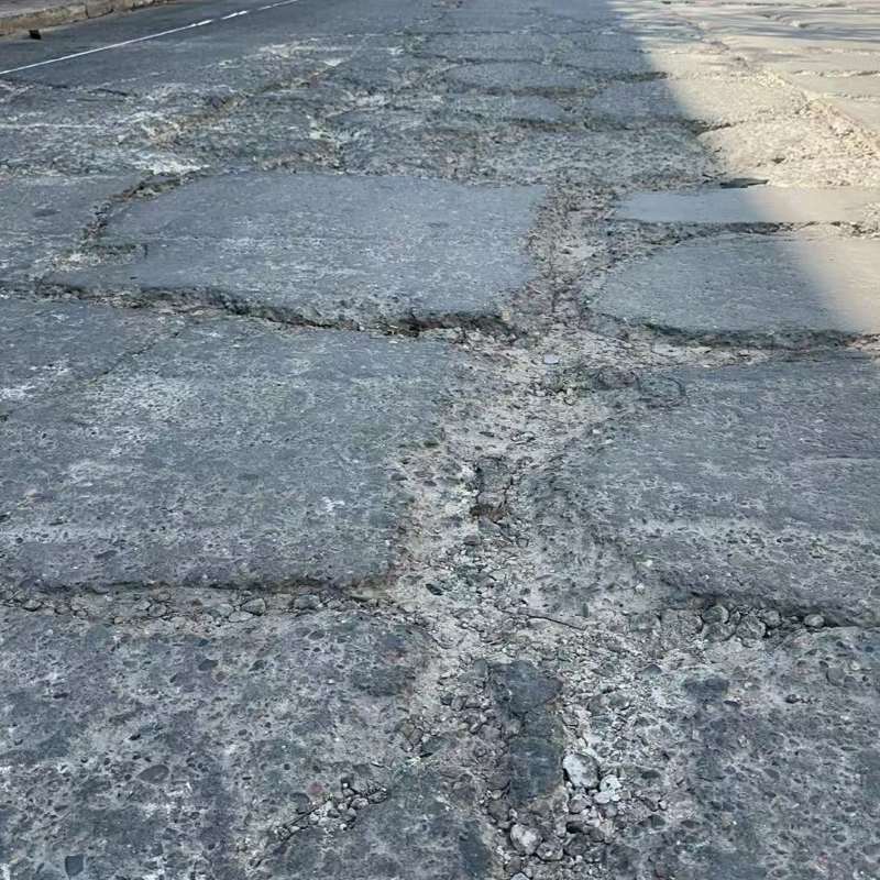 苍梧路面起砂露石子修补料